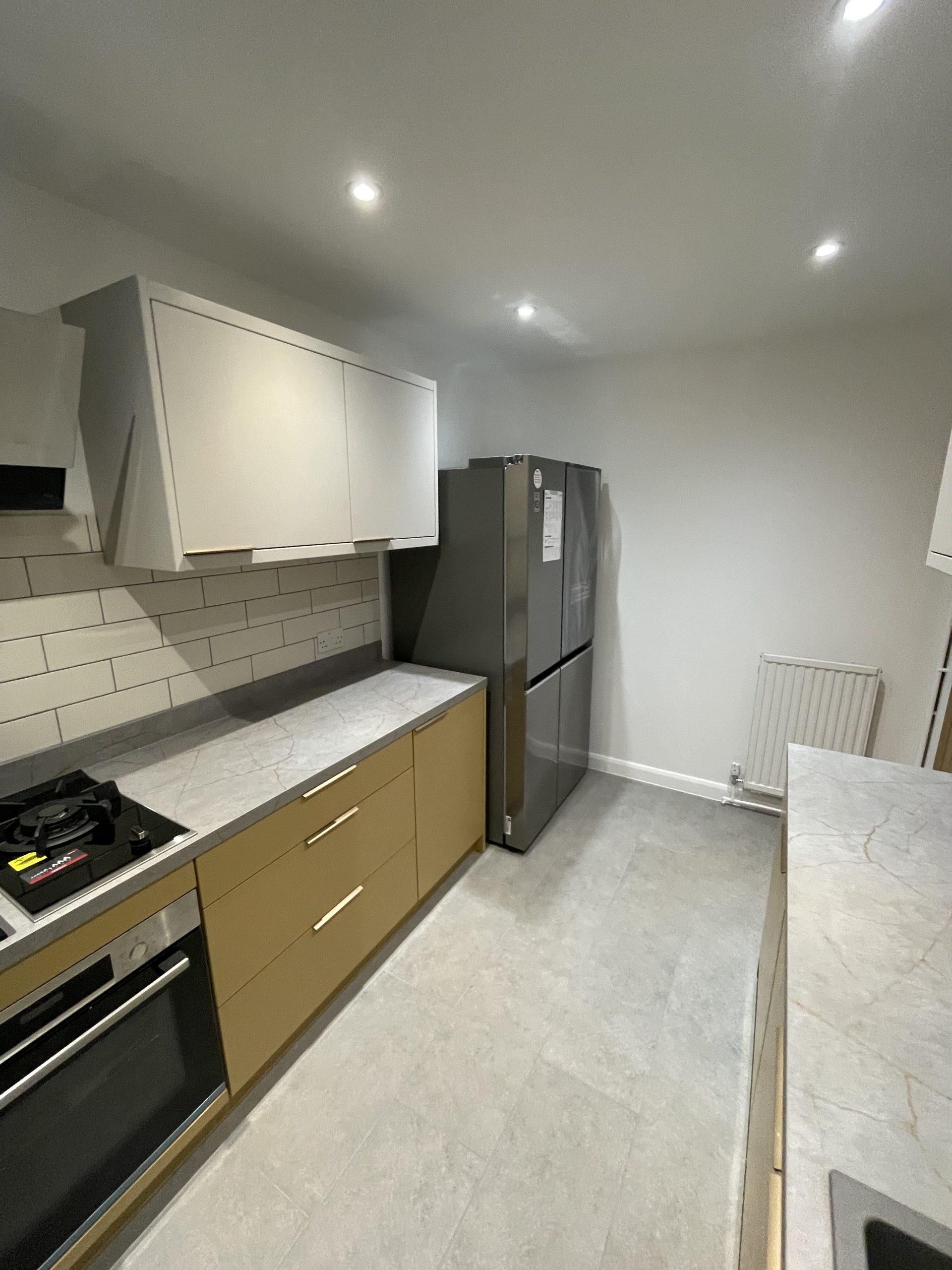 Kitchen fitting Reading Berkshire with white units and integrated appliances