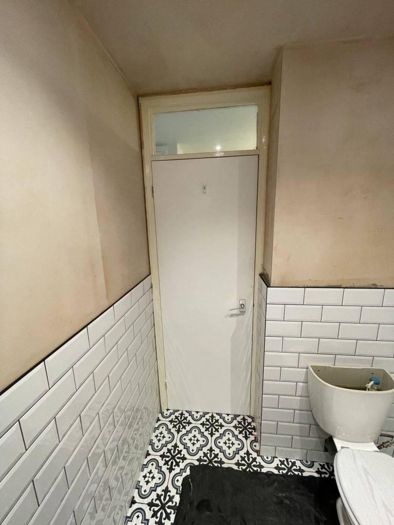 Modern vanity unit and black mixer tap installation – high-end bathroom fitting Reading.
